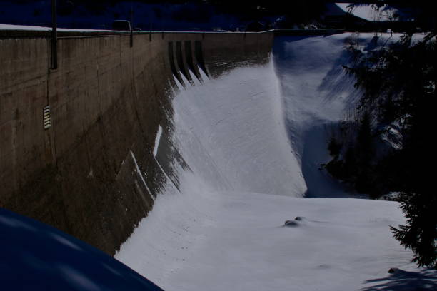 istock Dam in Schluchsee, which is covered by snow in winter 1211601193