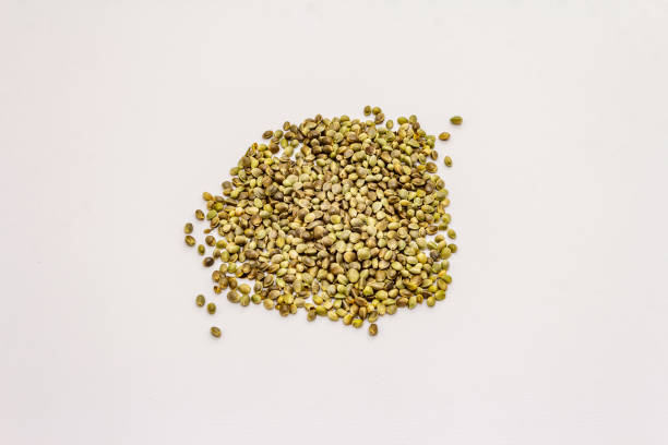 istock Ripe hemp seeds isolated on white background 1211601550