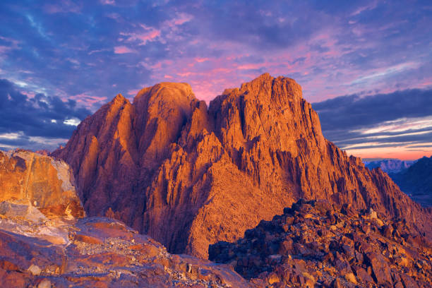 Beautiful view from the mountain. Panorama. Mountain range with visible silhouettes through the morning blue fog Beautiful view from the mountain. Panorama. Mountain range with visible silhouettes through the morning blue fog mt sinai stock pictures, royalty-free photos & images