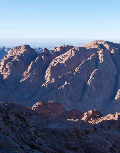 istock Beautiful view from the mountain. Panorama. Mountain range with visible silhouettes through the morning blue fog 1211603499