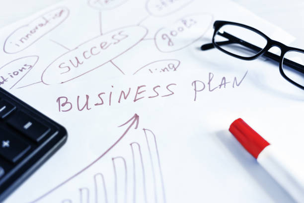 istock Business plan idea sketch with strategy and chart. Business planning concept. 1211604202