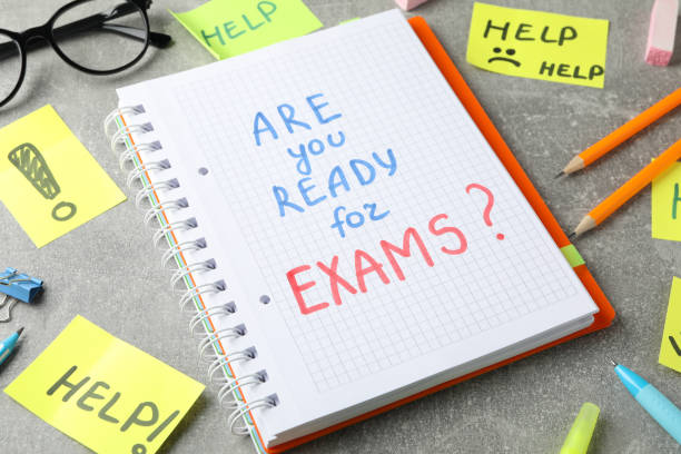 istock Inscriptions Are you ready for exams? and Help on grey background, close up 1211604373
