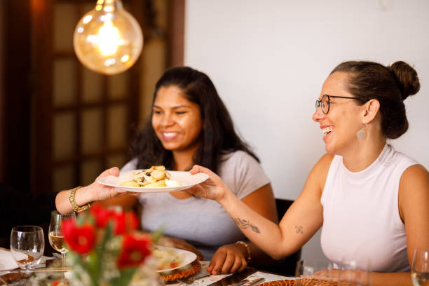 istock Young woman being served on table 1211606393