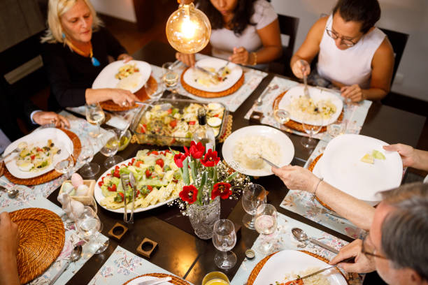 istock Family eating together on table for easter 1211606499