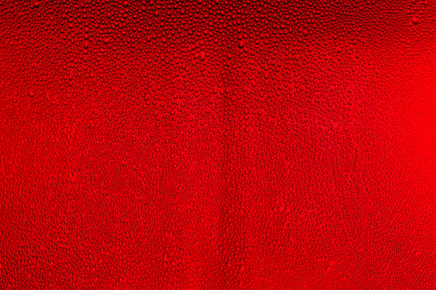 istock Water Drops background on the red glossy surface, Rain droplets on red texture. Natural fresh background,Abstract, Backgrounds, Blue, Bubble,Colored Background, Drop, Water, Abstract, Backgrounds 1211606738