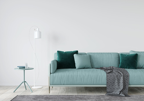 Mint-colored living room with a sofa on metal legs, a table and a white floor lamp. Neo mint / 3D illustration, 3d render