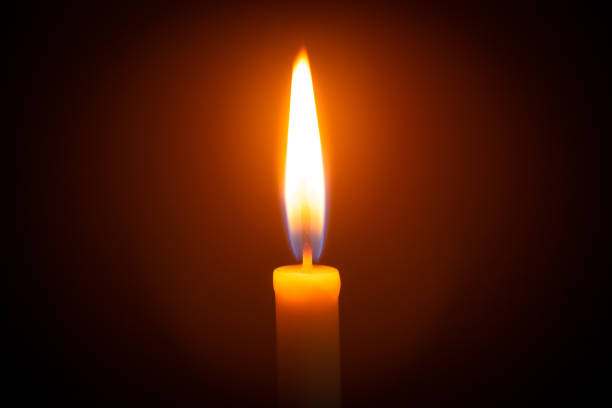 istock Blackout day so here's a candle,Candle, Flame, Candlelight, Dark, Black Background 1211607931