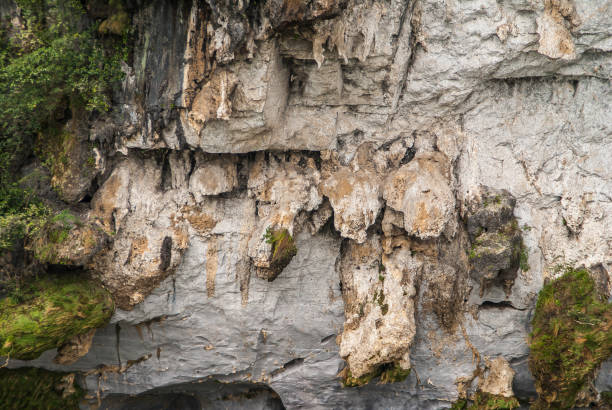 istock Hanging rock sheets on cliff along Li River in Guilin, China. 1211609743