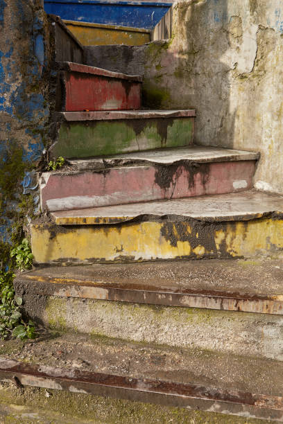 istock Spiral concrete staircase with rainbow colors. 1211610598