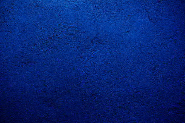 istock Blue colored abstract wall background with textures of different shades of blue 1211615114