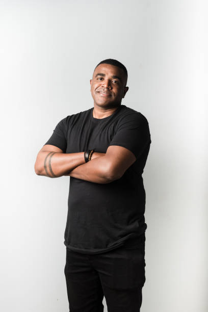 istock Adult man wearing black clothes on white background 1211615200