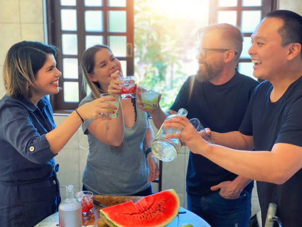 istock Weekend lunch with family, a delicious feijoada with caipirinha. 1211616972
