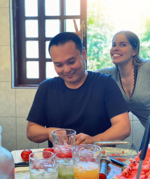 istock Weekend lunch with family, a delicious feijoada with caipirinha. 1211618172