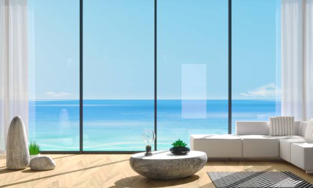 istock Panoramic window villa with blue sea views 1211618614