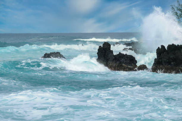 istock Ocean waves crashing on rocks 1211618876