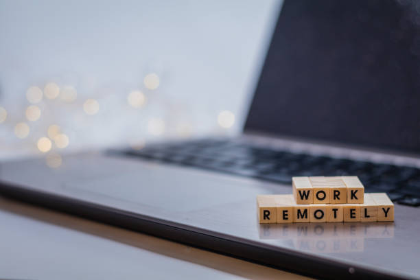 istock Work Remotely concept to suggest working anywhere anytime with laptop 1211618936