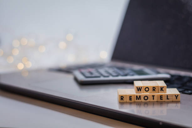 istock Work Remotely concept to suggest working anywhere anytime with laptop 1211618971