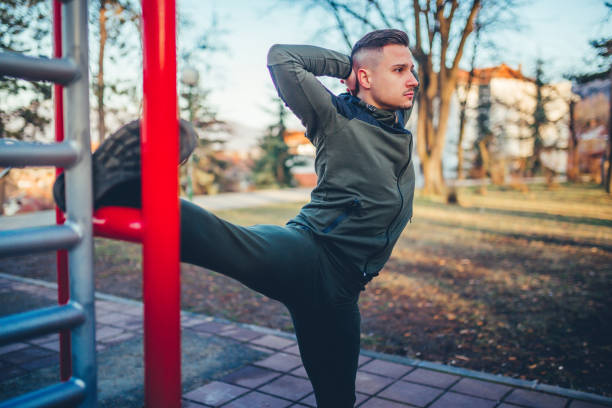 istock Fitness man stretching the leg 1211620398