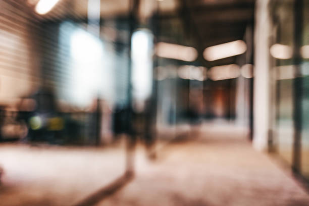 Abstract blur image background of airport terminal corridor Blurred office interior space background reception desk photos stock pictures, royalty-free photos & images