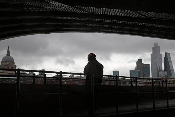 Builder under a bridge in London stock photo