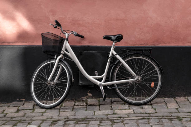 istock Bicycle near pink and black wall 1211627720