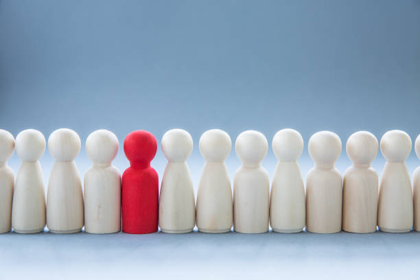 istock A lone person standing out for being different such as having Coronavirus and infecting others 1211628131