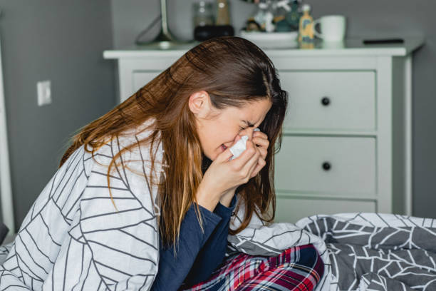 istock Young woman having a flu 1211634437
