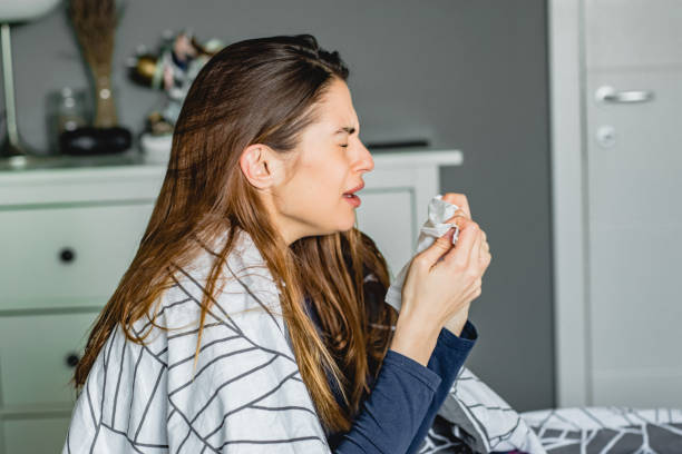 istock Young woman having a flu 1211634448