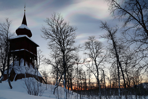 Kiruna Church in Winter, Sweden\nKiruna, located 145 kilometers (90 mi) north of the Arctic circle, is the northernmost town in Sweden.\nBuilt in 1912, Kiruna Church is one of Sweden's largest wooden buildings and has a gothic revival style exterior.