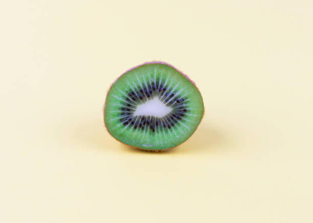 istock Slice of kiwi fruit isolated 1211645439