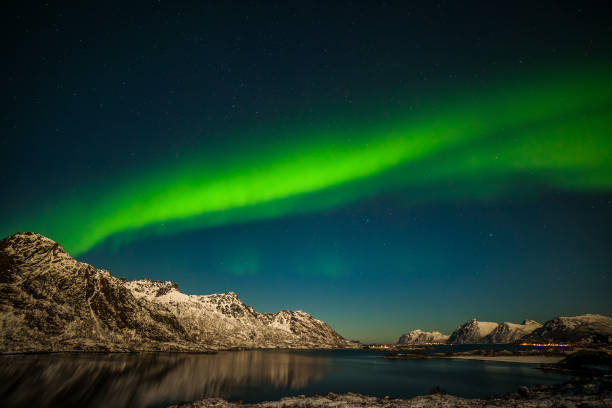 istock A wonderful night with Kp 5 northern lights flying over the mountains, long shutter speed. 1211647151
