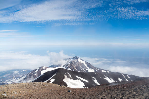 istock Above the clouds on a volcano, Kamchatka Peninsula, Russia. 1211650124