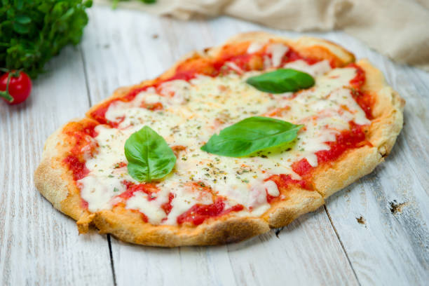istock margarita pizza at the Rome dough 1211651497