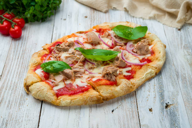 roman pizza with tuna on roman dough, pinsa - pizza tuna prepared fish cheese imagens e fotografias de stock