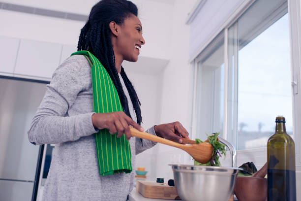 istock Woman preparing fresh salad. 1211653606