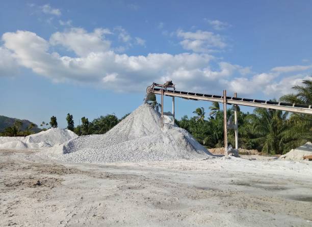 istock Machinery is crushing the gypsum ore at the mine for processing next step 1211658228