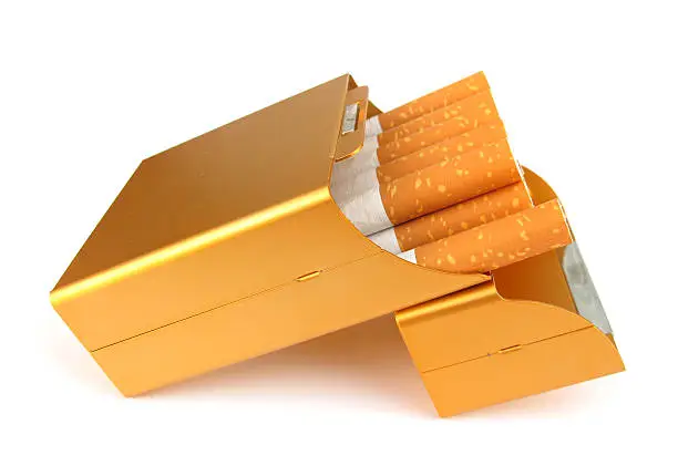 Photo of Cigarettes in metal golden box