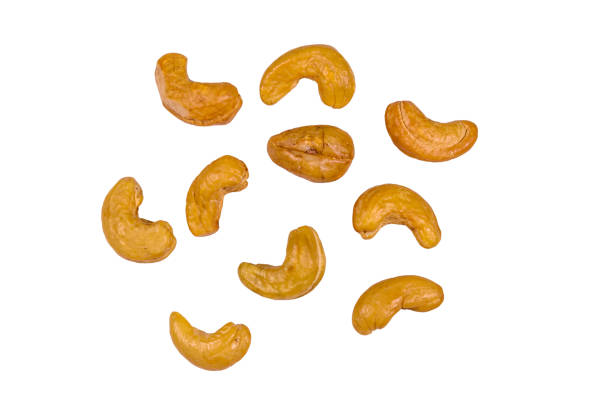 istock Roasted cashew nuts isolated on a white background 1211659208