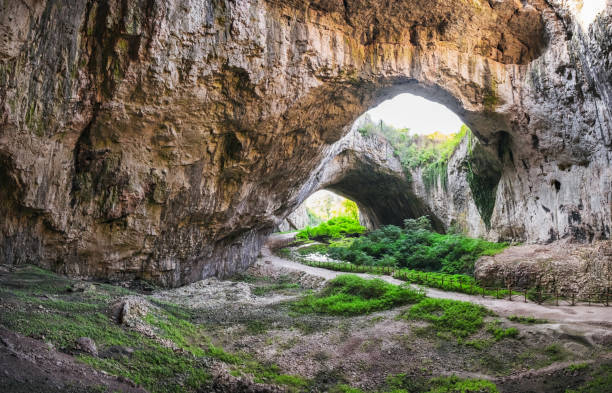 istock Devetashka cave interior, Lovech town, Bulgaria 1211662403