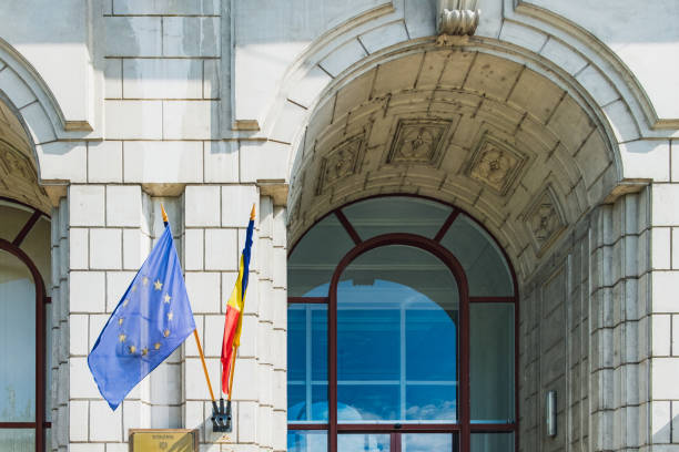 istock European Union and Romania flags on the wall 1211663051