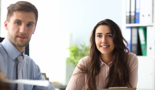 istock Cheerful brunette lady with colleague 1211663098