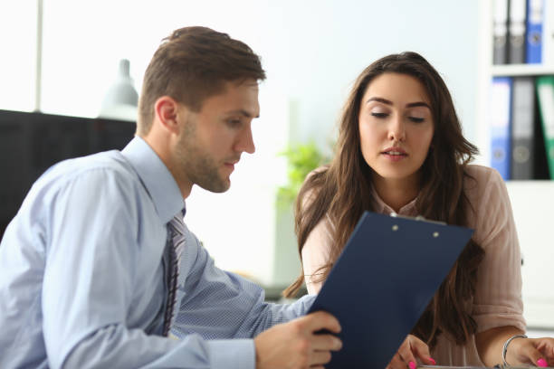 istock Head of company and worker 1211663099
