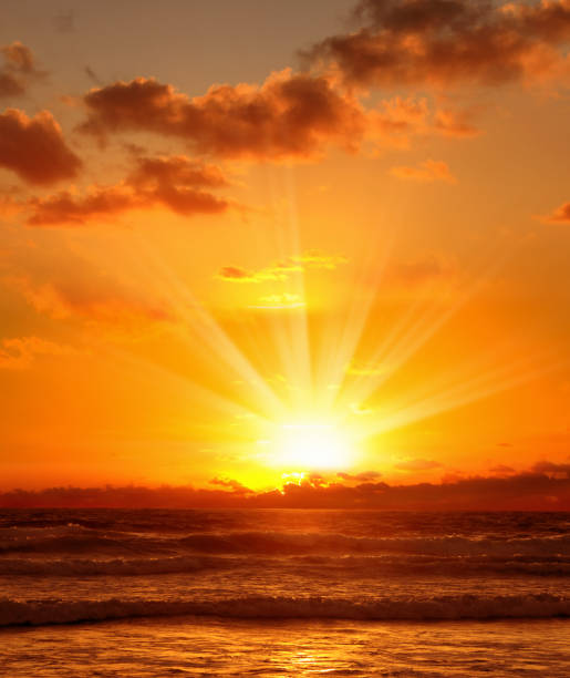 istock freshness of orange color sunset at beach 1211676174