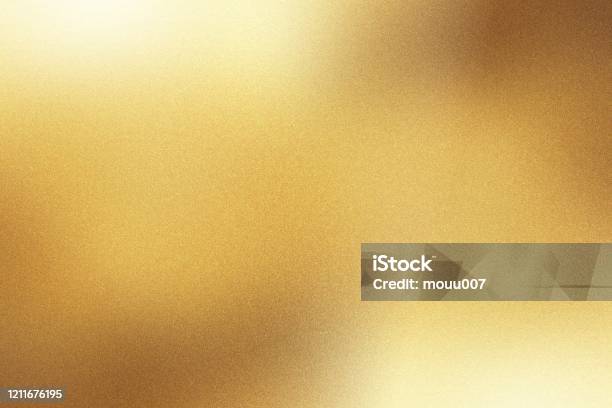 Light Shining Down On Gold Foil Metal Wall With Copy Space Abstract Background Stock Photo - Download Image Now