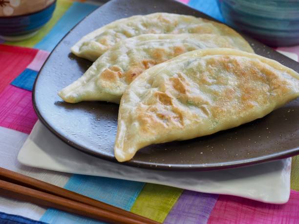 istock Asian food Dim sum, fried dumplings and green tea 1211677482