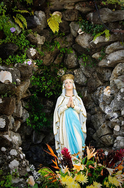 istock Virgin Mary statue in church grotto 121168909