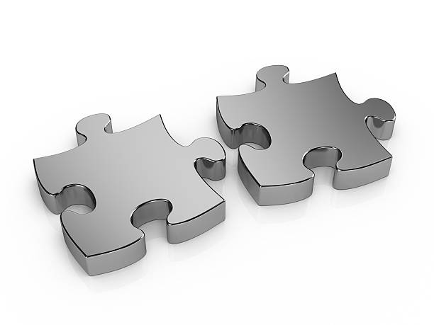 istock Two pieces metal puzzle 121169081