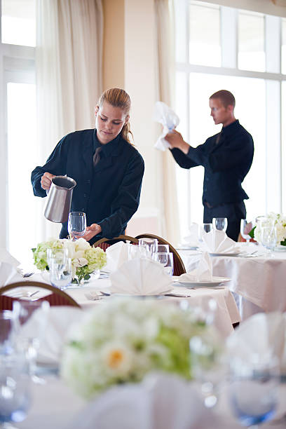 waiters setting banquet tables - restaurant waiter table wait staff 뉴스 사진 이미지