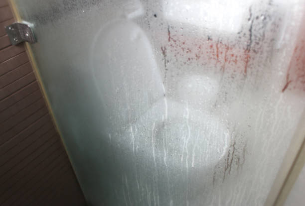 water closet in bathroom with steam droplet