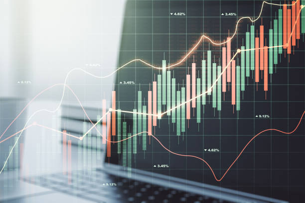 istock Double exposure of abstract creative financial chart on modern laptop background, research and strategy concept 1211700771
